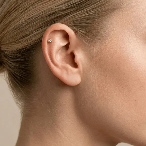 Przekłuwanie helix systemem Inverness Med — Cute Piercing Warszawa