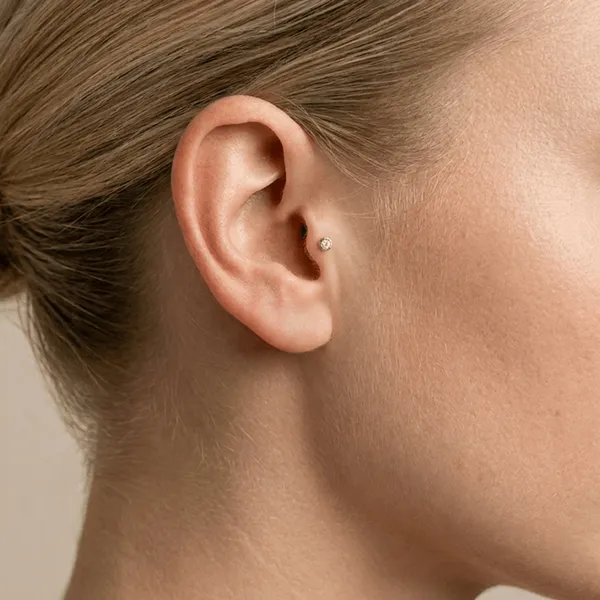 Przekłuwanie tragus systemem Inverness Med — Cute Piercing Warszawa